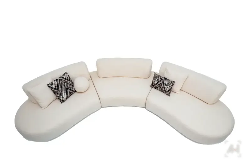 The curved bouclé sofa seen from above