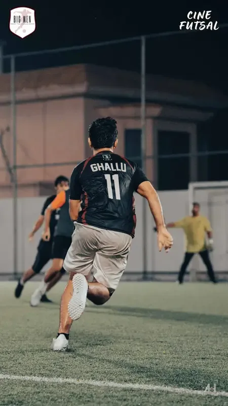 Ghallu, number 11, sprinting into space on the futsal pitch
